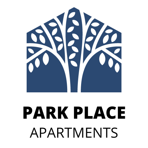 a silhouette of a tree in a blue background